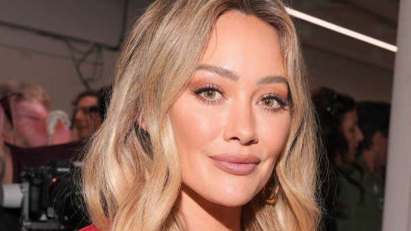 Hilary Duff wearing a red shirt