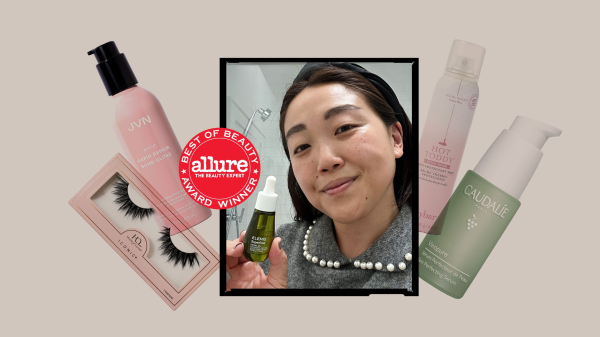 editor holding face oil with other prime day products in the background